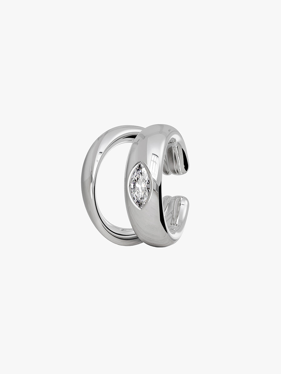 Arcenkelab Classic Ear Cuff in gold and silver finishes. This polished accessory offers versatile style, perfect for layering or solo wear.