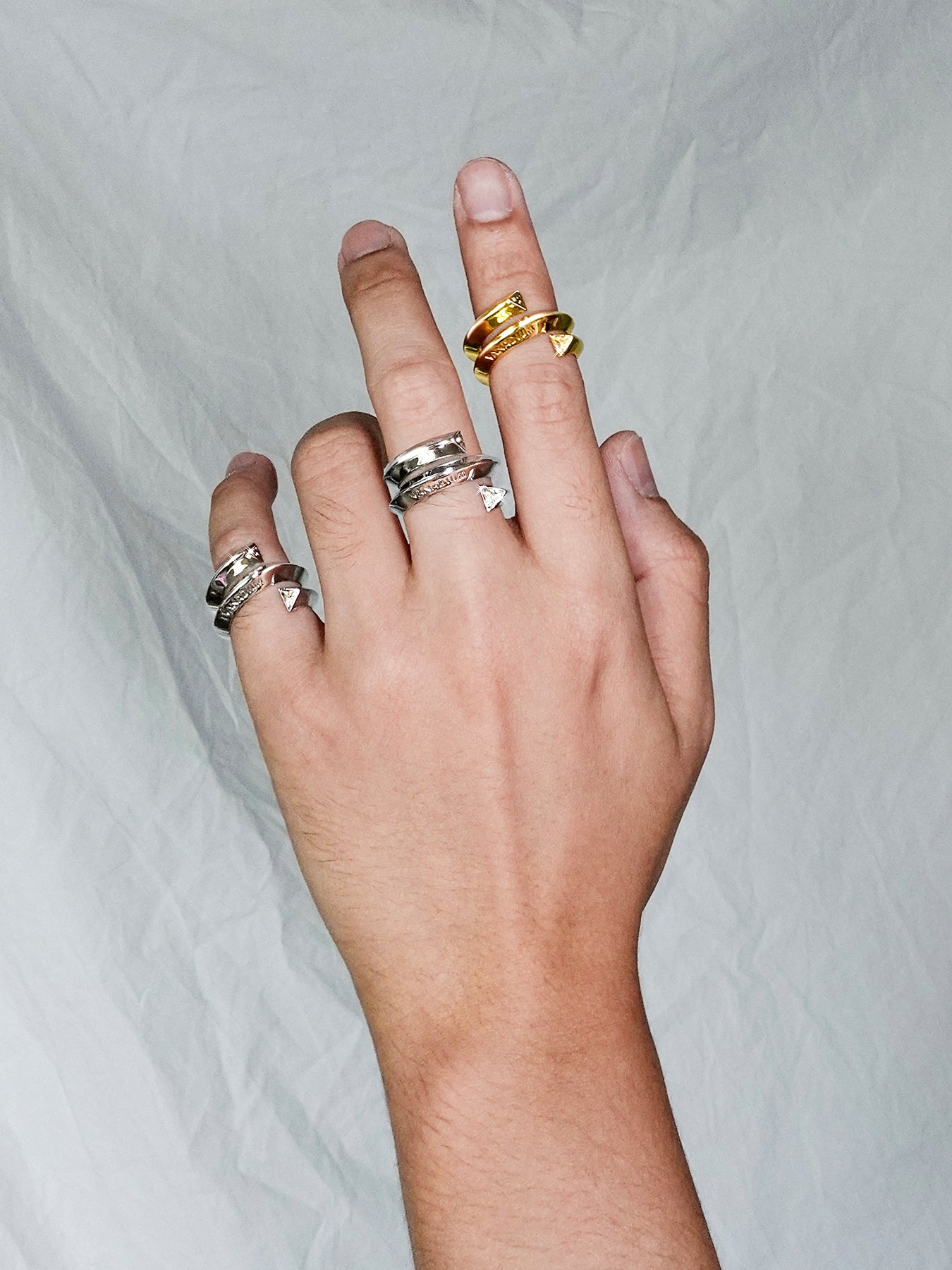 Arcenkelab Lumière Ring, a minimalist silver piece with sleek lines, perfect for layering or wearing solo for a chic look.