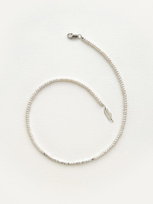 Arcenkelab Mini Pearl and Silver Necklace, featuring polished 925 silver and a minimalist design with sleek lines, perfect for any outfit.