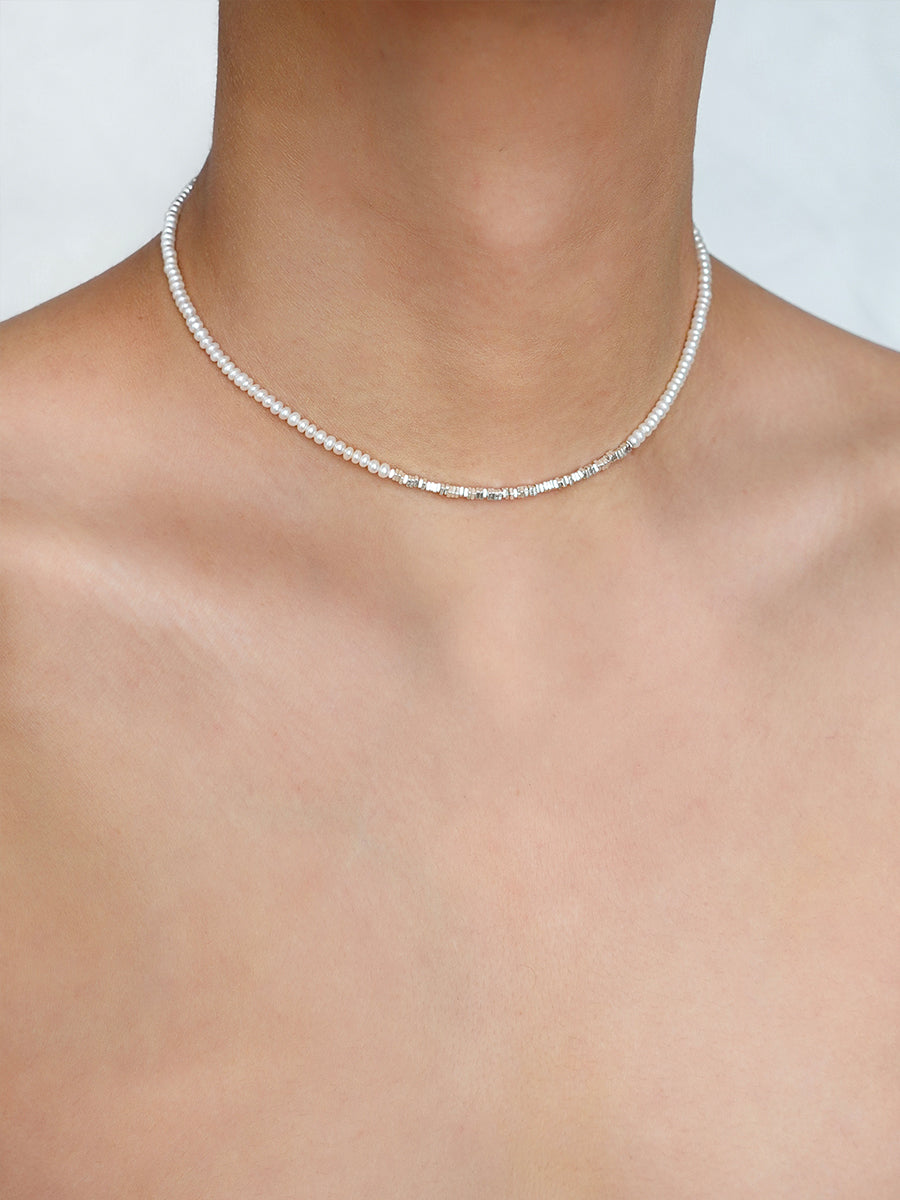 Arcenkelab Mini Pearl and Silver Necklace, featuring polished 925 silver and a minimalist design with sleek lines, perfect for any outfit.