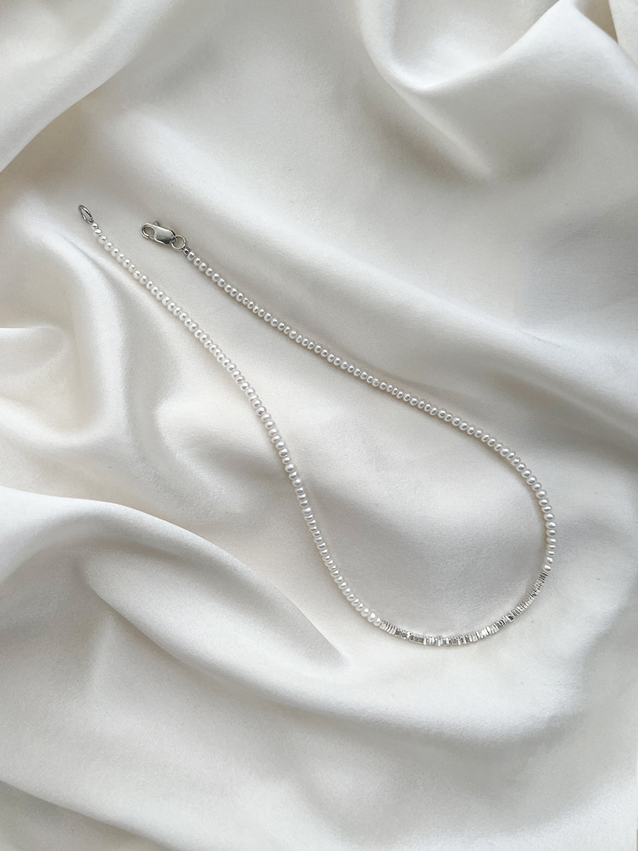 Arcenkelab Mini Pearl and Silver Necklace, featuring polished 925 silver and a minimalist design with sleek lines, perfect for any outfit.