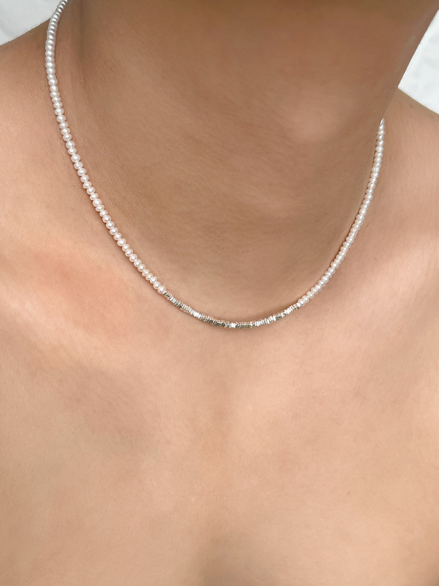 Arcenkelab Mini Pearl and Silver Necklace, featuring polished 925 silver and a minimalist design with sleek lines, perfect for any outfit.