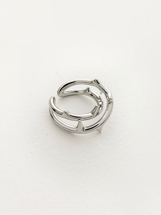 Arcenkelab Rose Thorn Ring is polished 925 silver and features a minimalist thorn design, adjustable band, and unisex style for versatile wear.