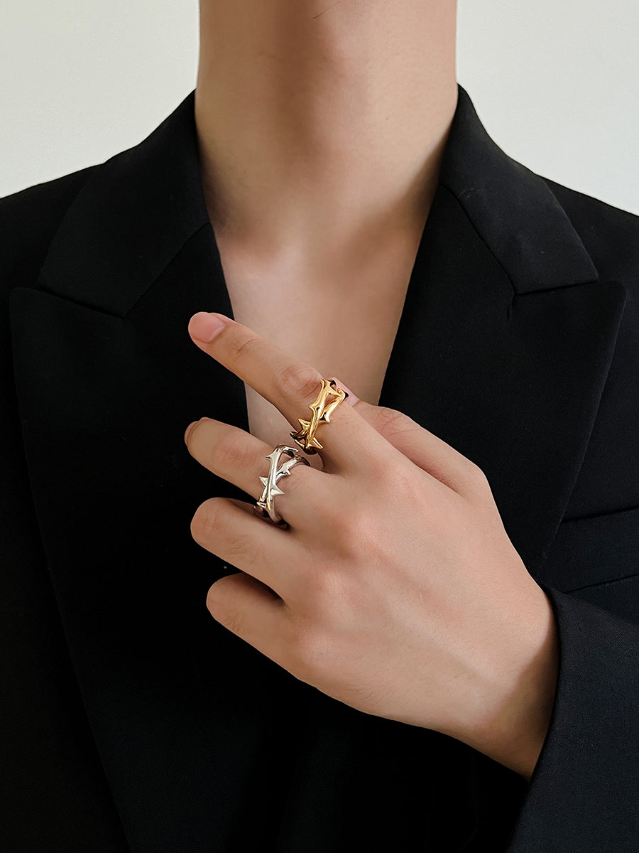 Arcenkelab Rose Thorn Ring in polished 925 silver, featuring a minimalist thorn design, adjustable band, and unisex style for versatile wear.
