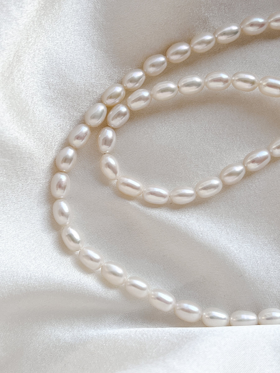 Arcenkelab Silver and Natural Pearl Necklace, featuring polished 925 silver with irregular geometric designs and minimalist pearls for a unisex, versatile accessory.